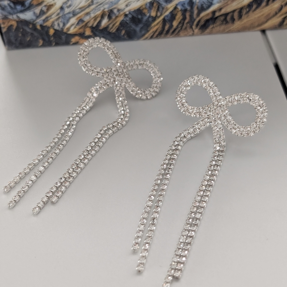 Elegant Silver Bow Dangle Earrings